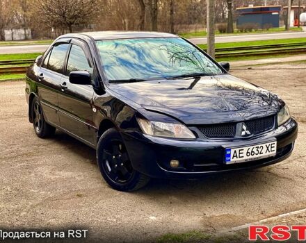 Черный Мицубиси Лансер, объемом двигателя 1.6 л и пробегом 197 тыс. км за 3950 $, фото 1 на Automoto.ua