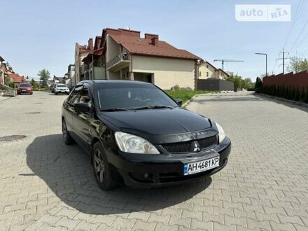 Чорний Міцубісі Lancer, об'ємом двигуна 1.6 л та пробігом 171 тис. км за 5300 $, фото 1 на Automoto.ua