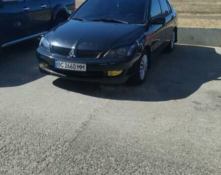 Чорний Міцубісі Lancer, об'ємом двигуна 1.6 л та пробігом 222 тис. км за 4700 $, фото 1 на Automoto.ua