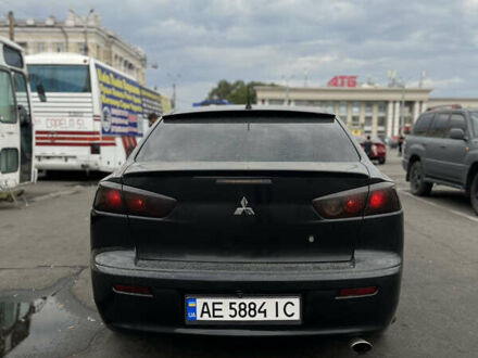 Черный Мицубиси Лансер, объемом двигателя 1.5 л и пробегом 300 тыс. км за 5800 $, фото 1 на Automoto.ua