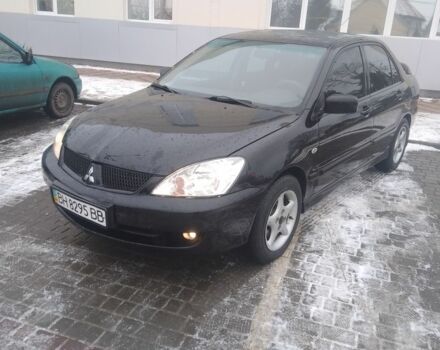 Чорний Міцубісі Lancer, об'ємом двигуна 1 л та пробігом 2 тис. км за 2700 $, фото 1 на Automoto.ua