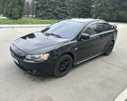 Чорний Міцубісі Lancer, об'ємом двигуна 2 л та пробігом 196 тис. км за 6300 $, фото 1 на Automoto.ua