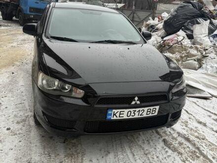 Черный Мицубиси Лансер, объемом двигателя 1.5 л и пробегом 206 тыс. км за 6000 $, фото 1 на Automoto.ua