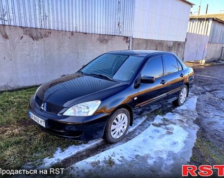 Черный Мицубиси Лансер, объемом двигателя 1.6 л и пробегом 22200 тыс. км за 4300 $, фото 1 на Automoto.ua