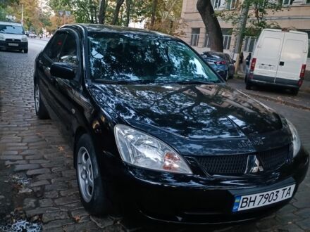 Мицубиси Лансер 2007 в Николаеве на Automoto.ua Черный Мицубиси Лансер, объемом двигателя 1.6 л и пробегом 250 тыс. км за 4200 $, фото 1 на Automoto.ua