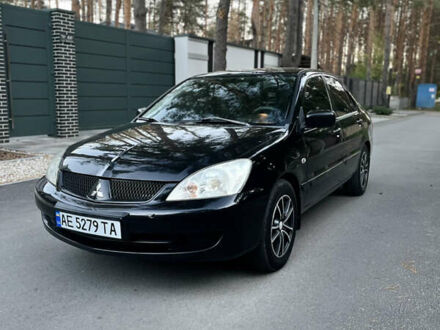 Чорний Міцубісі Lancer, об'ємом двигуна 1.58 л та пробігом 278 тис. км за 4800 $, фото 1 на Automoto.ua