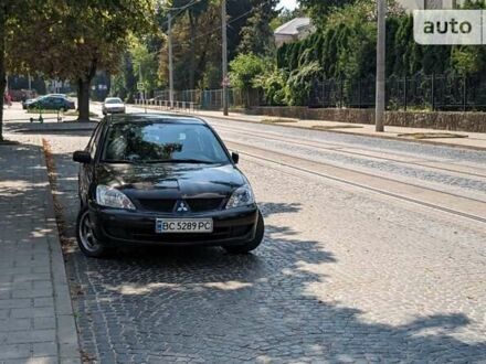 Чорний Міцубісі Lancer, об'ємом двигуна 1.6 л та пробігом 130 тис. км за 5500 $, фото 1 на Automoto.ua