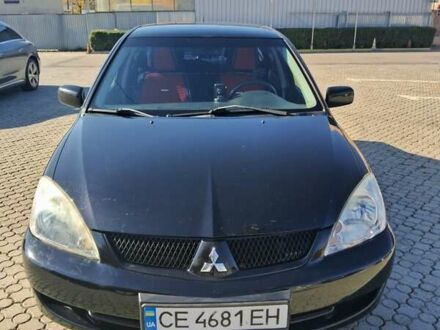 Мицубиси Лансер 2007 в Черновцах на Automoto.ua Черный Мицубиси Лансер, объемом двигателя 1.58 л и пробегом 247 тыс. км за 4300 $, фото 1 на Automoto.ua