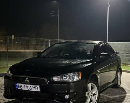 Черный Мицубиси Лансер, объемом двигателя 2 л и пробегом 320 тыс. км за 5300 $, фото 1 на Automoto.ua