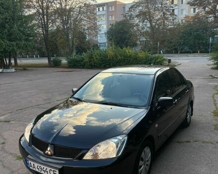 Чорний Міцубісі Lancer, об'ємом двигуна 1.6 л та пробігом 240 тис. км за 3650 $, фото 1 на Automoto.ua