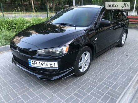 Чорний Міцубісі Lancer, об'ємом двигуна 2 л та пробігом 187 тис. км за 7000 $, фото 1 на Automoto.ua