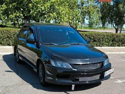 Мицубиси Лансер 2007 в Южноукраинске на Automoto.ua Черный Мицубиси Лансер, объемом двигателя 2 л и пробегом 161 тыс. км за 5000 $, фото 1 на Automoto.ua