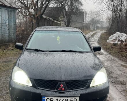 Чорний Міцубісі Lancer, об'ємом двигуна 1.6 л та пробігом 264 тис. км за 3600 $, фото 1 на Automoto.ua