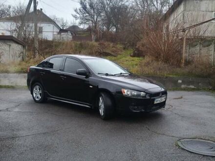 Чорний Міцубісі Lancer, об'ємом двигуна 2 л та пробігом 116 тис. км за 7200 $, фото 1 на Automoto.ua