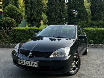 Черный Мицубиси Лансер, объемом двигателя 1.6 л и пробегом 131 тыс. км за 4350 $, фото 1 на Automoto.ua