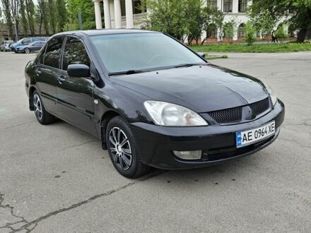 Чорний Міцубісі Lancer, об'ємом двигуна 1.6 л та пробігом 214 тис. км за 3500 $, фото 1 на Automoto.ua