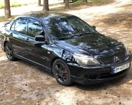 Чорний Міцубісі Lancer, об'ємом двигуна 2 л та пробігом 170 тис. км за 5650 $, фото 1 на Automoto.ua
