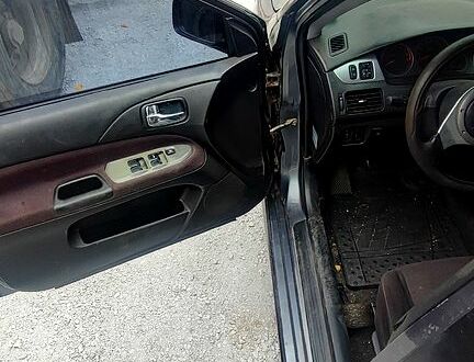 Міцубісі Lancer 2007 у Дніпро (Дніпропетровську) на Automoto.ua Чорний Міцубісі Lancer, об'ємом двигуна 2 л та пробігом 200 тис. км за 1800 $, фото 1 на Automoto.ua