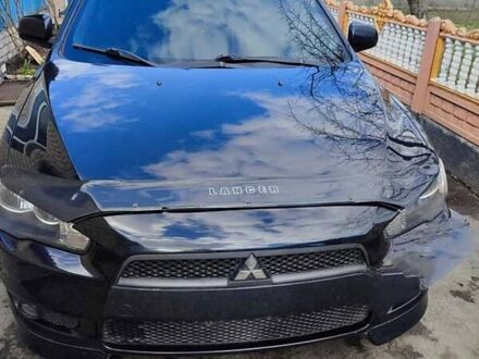 Міцубісі Lancer 2007 у Александровке на Automoto.ua Чорний Міцубісі Lancer, об'ємом двигуна 2 л та пробігом 191 тис. км за 6500 $, фото 1 на Automoto.ua