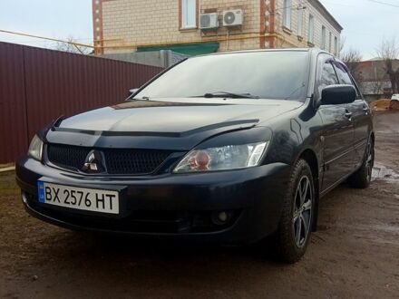 Чорний Міцубісі Lancer, об'ємом двигуна 1.6 л та пробігом 130 тис. км за 4999 $, фото 1 на Automoto.ua