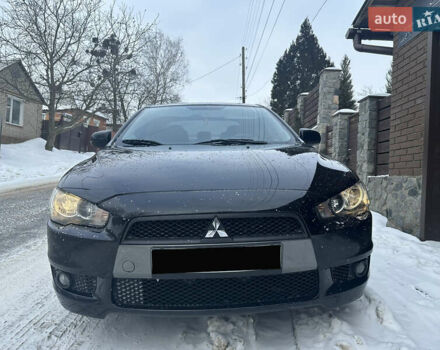 Чорний Міцубісі Lancer, об'ємом двигуна 2 л та пробігом 200 тис. км за 6800 $, фото 1 на Automoto.ua