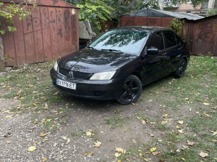 Мицубиси Лансер 2007 в Каменце-Подольском на Automoto.ua Черный Мицубиси Лансер, объемом двигателя 1.6 л и пробегом 258 тыс. км за 3099 $, фото 1 на Automoto.ua