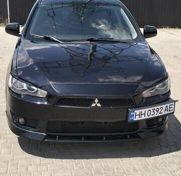 Черный Мицубиси Лансер, объемом двигателя 2 л и пробегом 285 тыс. км за 5500 $, фото 1 на Automoto.ua