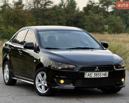 Чорний Міцубісі Lancer, об'ємом двигуна 2 л та пробігом 321 тис. км за 5799 $, фото 1 на Automoto.ua