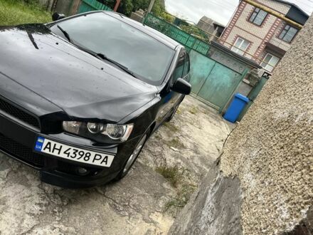 Черный Мицубиси Лансер, объемом двигателя 2 л и пробегом 200 тыс. км за 6900 $, фото 1 на Automoto.ua