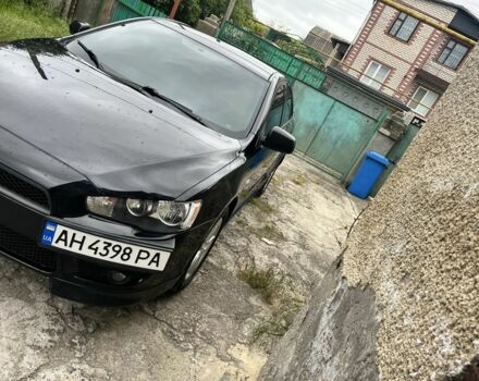 Чорний Міцубісі Lancer, об'ємом двигуна 2 л та пробігом 200 тис. км за 6900 $, фото 1 на Automoto.ua