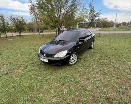 Чорний Міцубісі Lancer, об'ємом двигуна 1.6 л та пробігом 280 тис. км за 4088 $, фото 1 на Automoto.ua