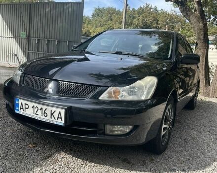 Чорний Міцубісі Lancer, об'ємом двигуна 1.6 л та пробігом 232 тис. км за 4500 $, фото 1 на Automoto.ua