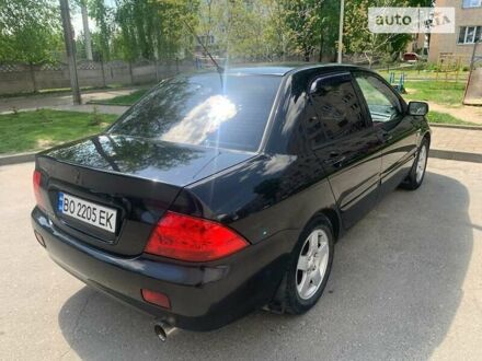 Міцубісі Lancer 2007 у Тернополі на Automoto.ua Чорний Міцубісі Lancer, об'ємом двигуна 1.6 л та пробігом 219 тис. км за 5600 $, фото 1 на Automoto.ua