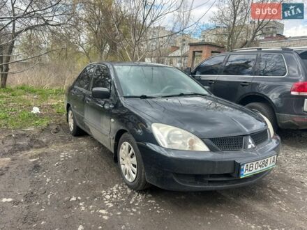 Чорний Міцубісі Lancer, об'ємом двигуна 1.6 л та пробігом 260 тис. км за 3050 $, фото 1 на Automoto.ua
