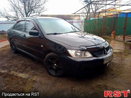 Чорний Міцубісі Lancer, об'ємом двигуна 1.6 л та пробігом 300 тис. км за 4600 $, фото 1 на Automoto.ua