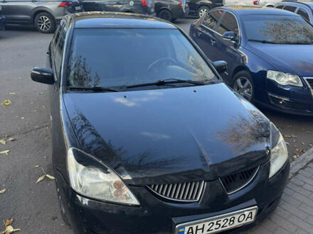 Міцубісі Lancer 2007 у Павлограде на Automoto.ua Чорний Міцубісі Lancer, об'ємом двигуна 1.58 л та пробігом 243 тис. км за 3800 $, фото 1 на Automoto.ua
