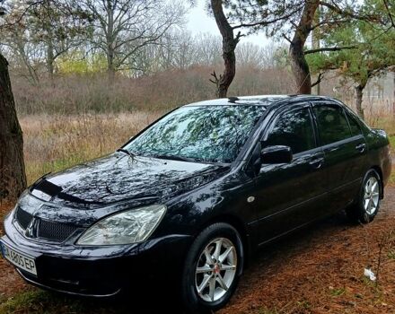 Чорний Міцубісі Lancer, об'ємом двигуна 1.6 л та пробігом 240 тис. км за 4700 $, фото 1 на Automoto.ua