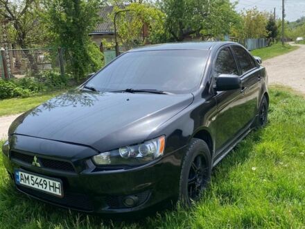 Чорний Міцубісі Lancer, об'ємом двигуна 2 л та пробігом 276 тис. км за 4700 $, фото 1 на Automoto.ua