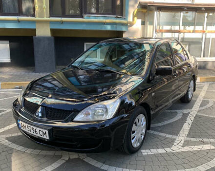 Чорний Міцубісі Lancer, об'ємом двигуна 1.6 л та пробігом 284 тис. км за 4500 $, фото 1 на Automoto.ua