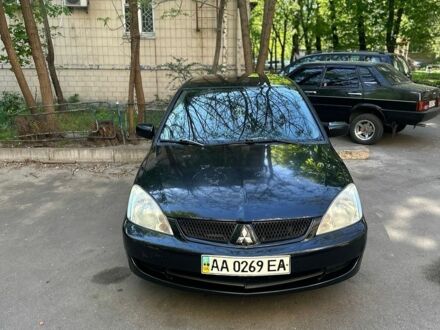 Чорний Міцубісі Lancer, об'ємом двигуна 1.58 л та пробігом 279 тис. км за 4500 $, фото 1 на Automoto.ua