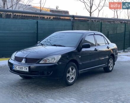 Черный Мицубиси Лансер, объемом двигателя 1.6 л и пробегом 240 тыс. км за 3850 $, фото 1 на Automoto.ua