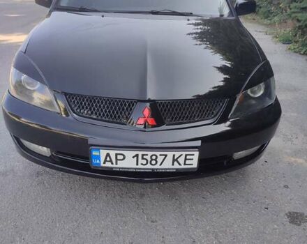 Чорний Міцубісі Lancer, об'ємом двигуна 1.6 л та пробігом 210 тис. км за 4300 $, фото 1 на Automoto.ua