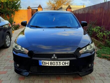 Чорний Міцубісі Lancer, об'ємом двигуна 2 л та пробігом 174 тис. км за 6800 $, фото 1 на Automoto.ua