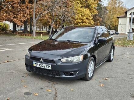 Мицубиси Лансер 2007 в Киеве на Automoto.ua Черный Мицубиси Лансер, объемом двигателя 2 л и пробегом 115 тыс. км за 5000 $, фото 1 на Automoto.ua