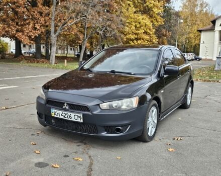 Мицубиси Лансер 2007 в Киеве на Automoto.ua Черный Мицубиси Лансер, объемом двигателя 2 л и пробегом 115 тыс. км за 5000 $, фото 1 на Automoto.ua