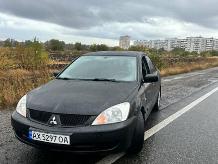 Мицубиси Лансер 2007 в Харькове на Automoto.ua Черный Мицубиси Лансер, объемом двигателя 1.58 л и пробегом 149 тыс. км за 4500 $, фото 1 на Automoto.ua