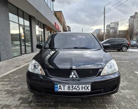 Чорний Міцубісі Lancer, об'ємом двигуна 1.6 л та пробігом 258 тис. км за 4300 $, фото 1 на Automoto.ua