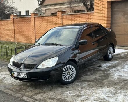 Чорний Міцубісі Lancer, об'ємом двигуна 1.6 л та пробігом 167 тис. км за 4500 $, фото 1 на Automoto.ua