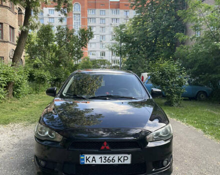Чорний Міцубісі Lancer, об'ємом двигуна 2 л та пробігом 271 тис. км за 5700 $, фото 1 на Automoto.ua