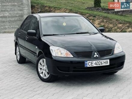 Мицубиси Лансер 2007 в Черновцах на Automoto.ua Черный Мицубиси Лансер, объемом двигателя 1.58 л и пробегом 243 тыс. км за 4950 $, фото 1 на Automoto.ua